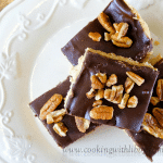 These No Bake Chocolate Peanut Butter Bars resemble Buckeye Candy, except they are in bar form. Assembly is simple and they do not require baking.
